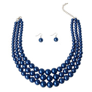 Royal Blue Majesty Layered Pearl Necklace Set - Three strands of graduated royal blue pearls, perfect for adding elegance to any outfit. EJIJI Boutique