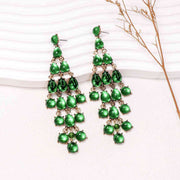 A close-up image of Sparkling Elegance Dangle Earrings, showcasing their stunning design crafted from alloy and rhinestones. The earrings measure 5.2 by 1.7 inches, making a bold yet refined statement. Embrace sophistication with lasting brilliance, but remember to avoid wear during exercise for optimal durability. EJIJI Boutique