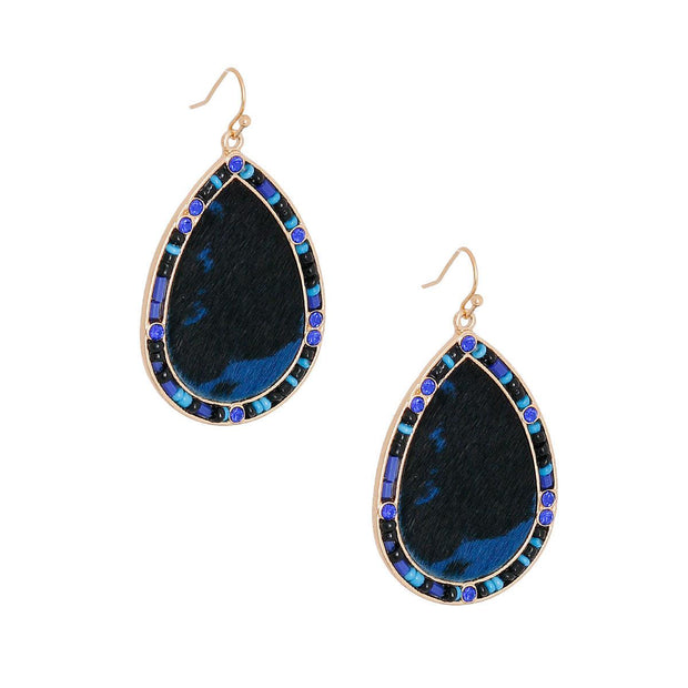 Blue Leather Teardrop Earrings Leather Drop Earrings Gold Metal Fish Hook Earring backs. Featuring blue drop earring and Seed Bead Trim Details. Leather earrings measure 1.25 inches wide Buy 10 pieces of jewelry, Get the 11th piece of jewelry Free!