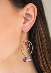 Silver hoop earrings with red pearl and fringe detail. EJIJI Boutique
