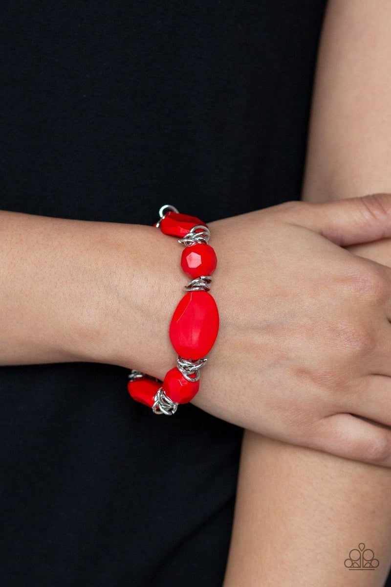 Red Paparazzi Bracelet - Faux-rock finish with faceted red beads and silver links. EJIJI Boutique  