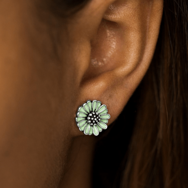 Green Paparazzi earrings with dainty petals and textured silver center. EJIJI Boutique 
